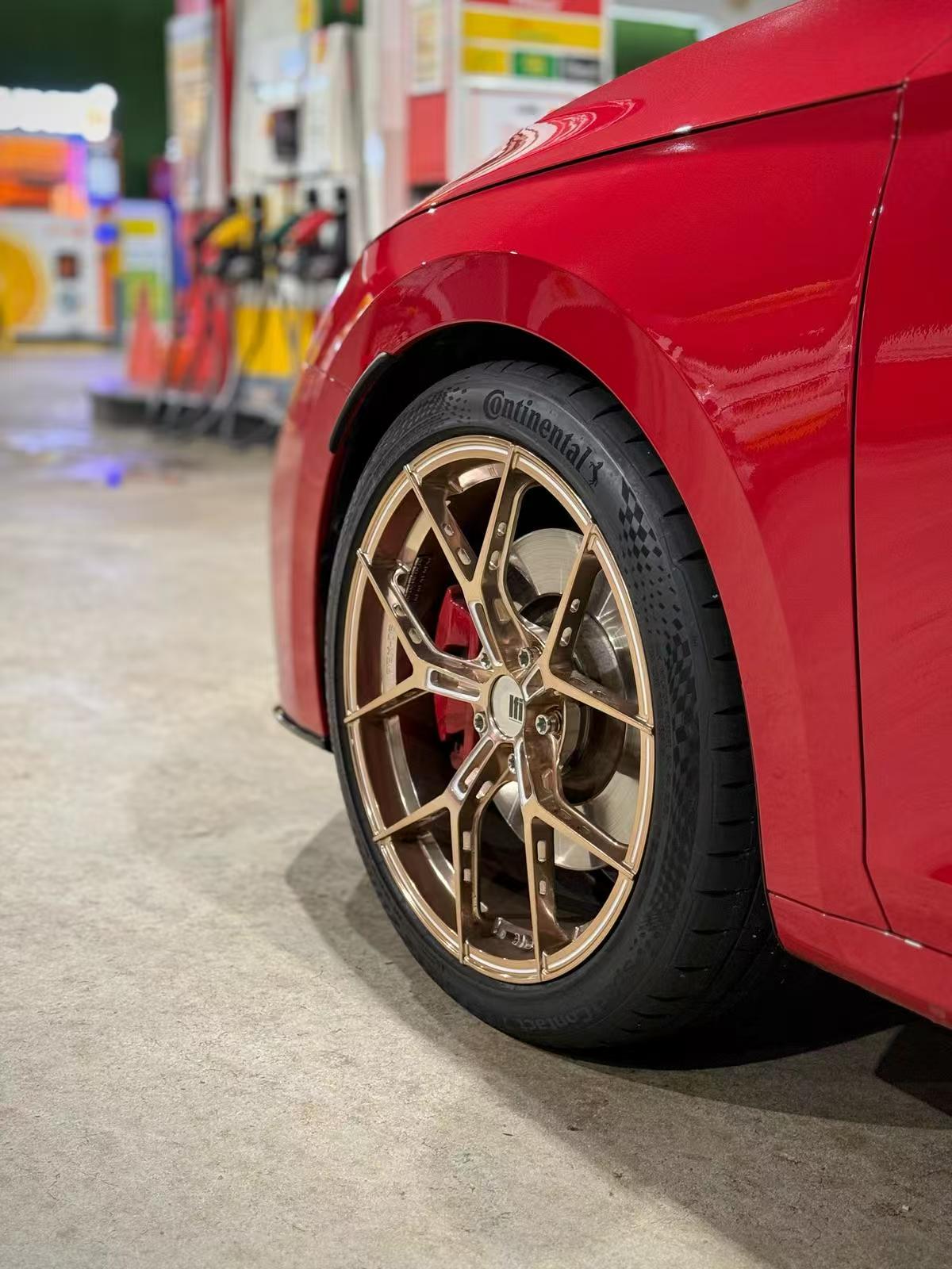 LFI REX-06 V2 hollow spoke pocketing and brake clearance on red car